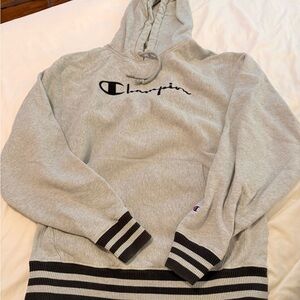 Large Grey Champion Hoodie with Striped detailing.
